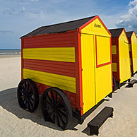 Row of colourful beach cabins, De Panne, Belgium 