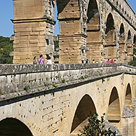 Tourists at the Pont du Gard, an ancient aqueduct in France