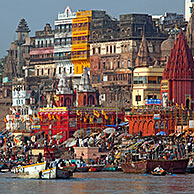 Holy city and colourful rowing boats on the Ganges river at Varanasi, Uttar Pradesh, India